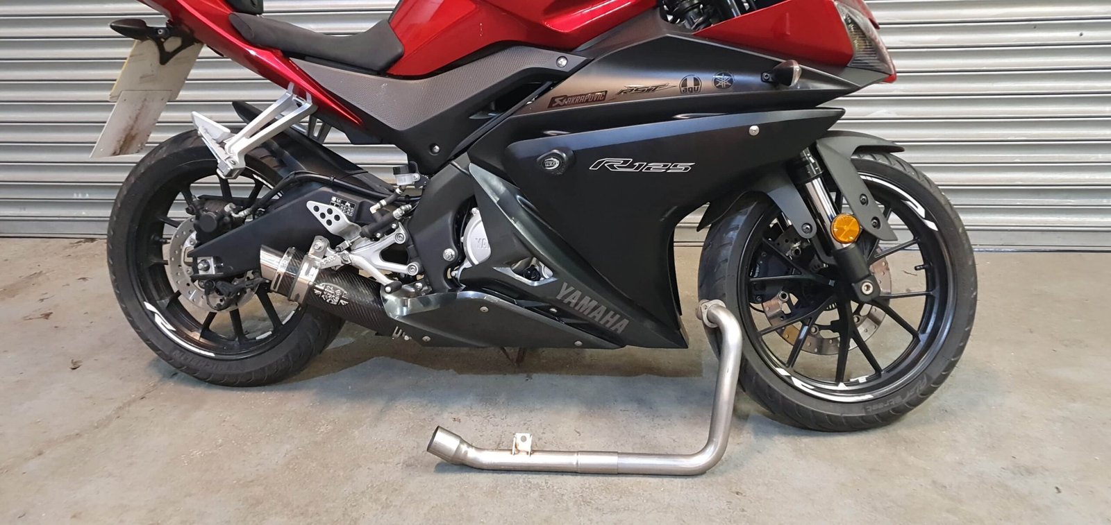 Yamaha YZF-R125 full stainless system and Mini oval exhaust full stainless system detail
