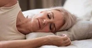 woman sleeping in bed