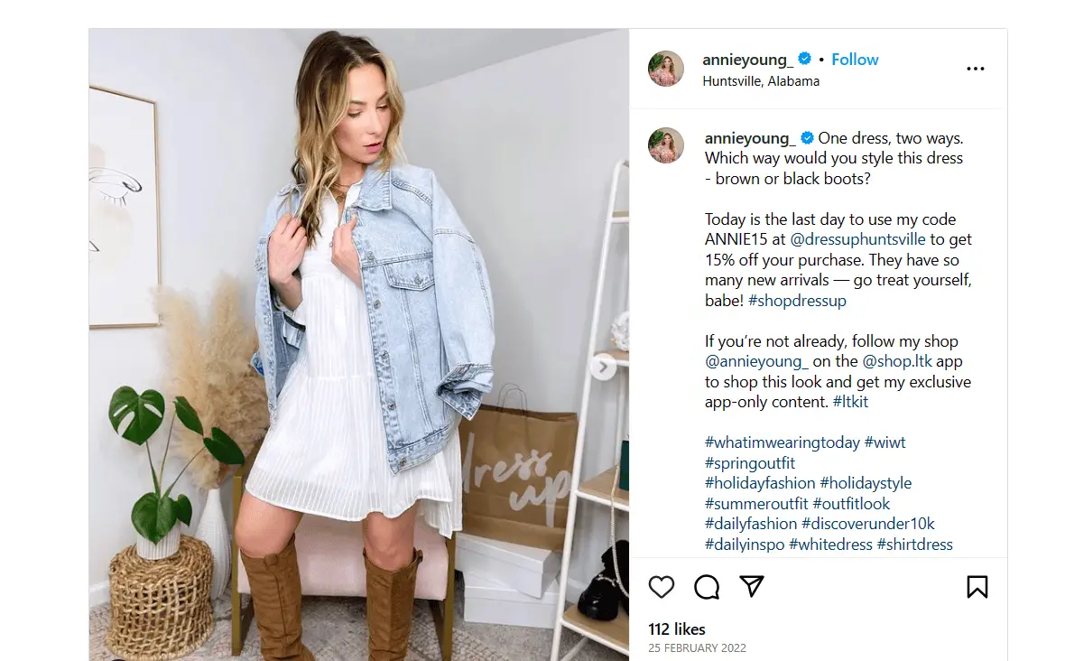 How to Align Influencers and Affiliates to Your Marketing Strategy 4 The image shows an influencer dressed in a slightly above knee length white dress with a denim jacket hanging on her shoulders. She can also be seen wearing boots. The caption tells how this dress can be styled in two ways. She also added her unique discount code to get the dress at a discounted price.