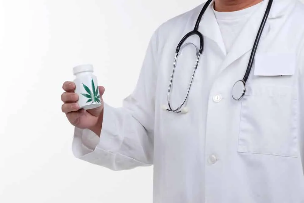 Doctor Holding a medicine cup
