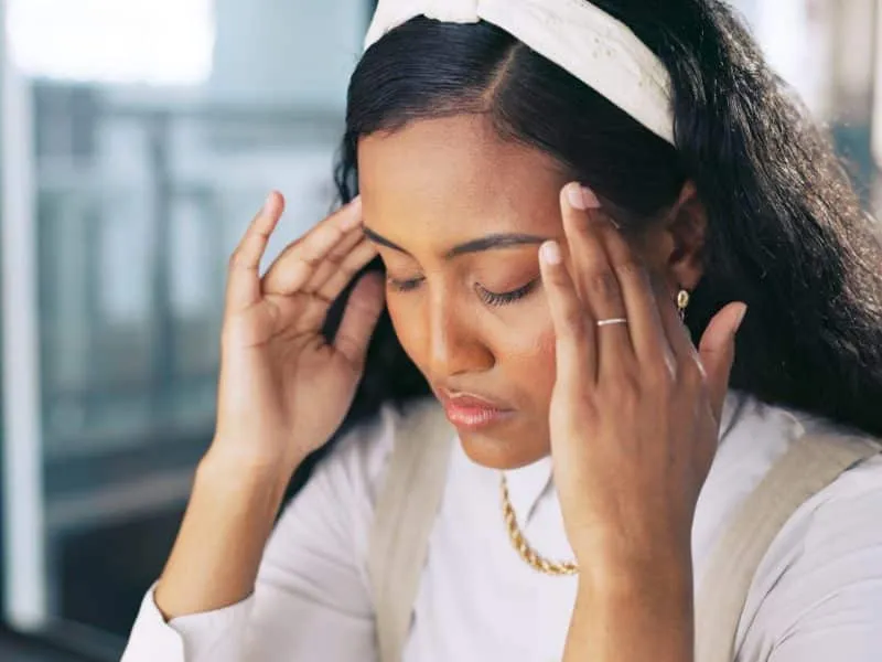 Headache, stress and business woman with burnout, anxiety and mistake on computer pc. Tired, sad an.