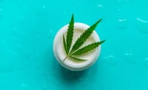 cosmetic with cannabis leaf