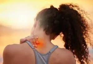 Cropped shot of a woman experiencing shoulder pain during her workout.