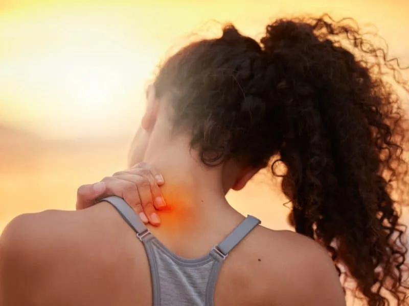 Cropped shot of a woman experiencing shoulder pain during her workout.