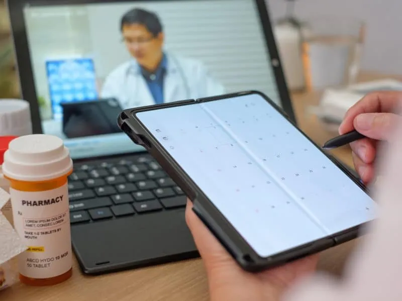 person consulting with doctor virtually