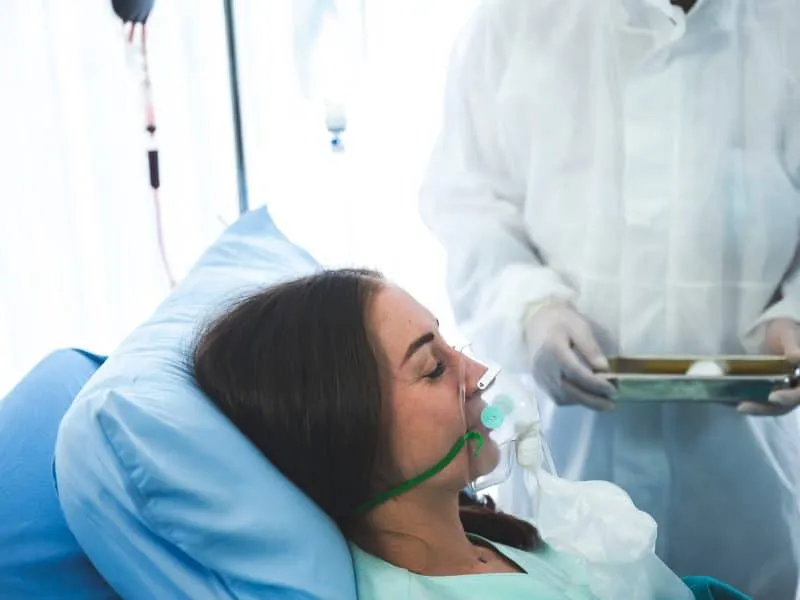 Young woman suffering with Emphysema
