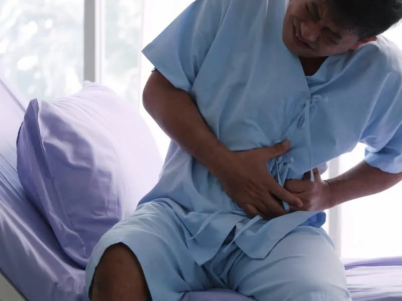 Elderly Asian male patient is hospitalized with stomachache.