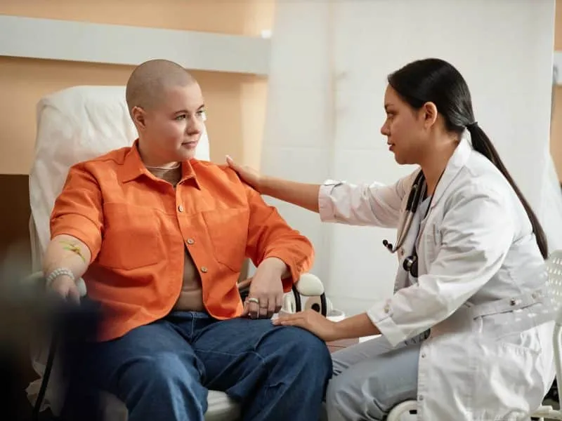 nurse talking to patient