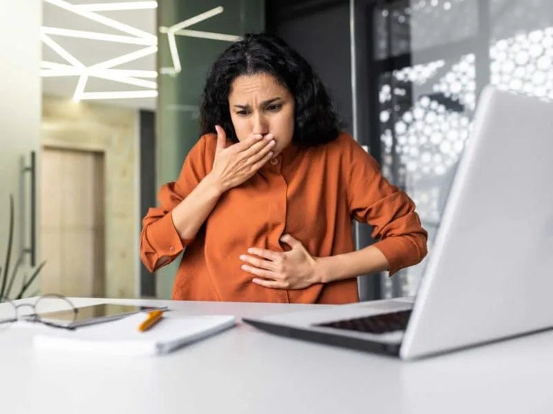 woman in the office with intractable vomitting