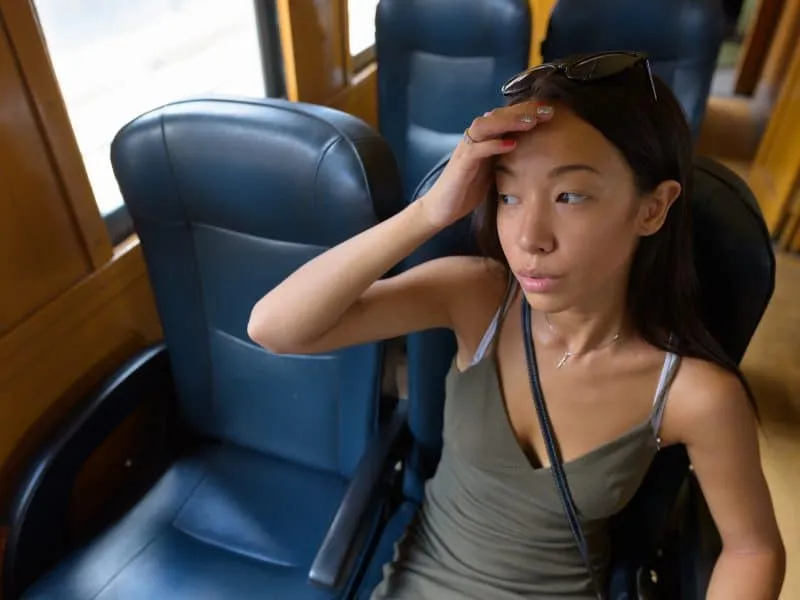 Portrait of young beautiful multi-ethnic tourist woman exploring the city of Bangkok, Thailand