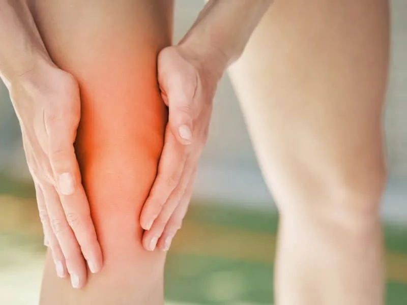 Red knee pain, legs and emergency of sports woman, athlete and runner training, body workout and ou.