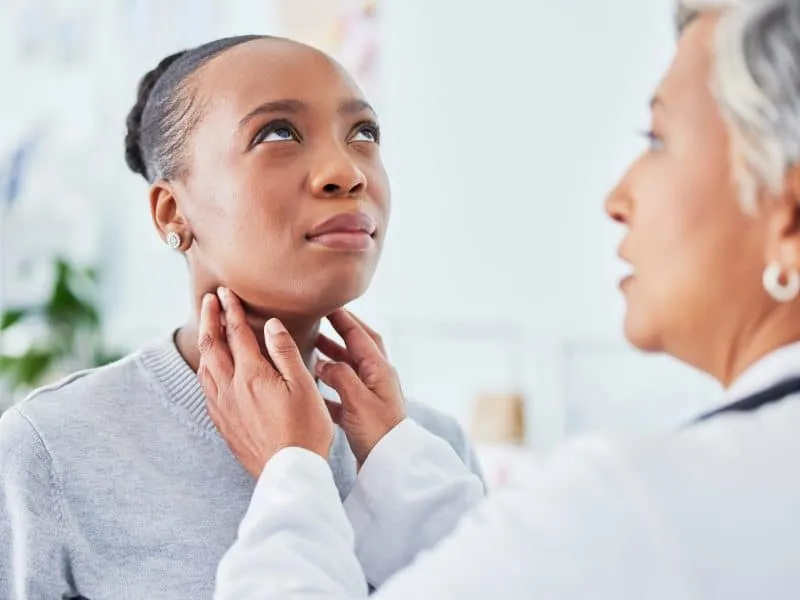 Sore throat, doctor and woman patient in hospital for virus, pain or infection. Healthcare worker a.