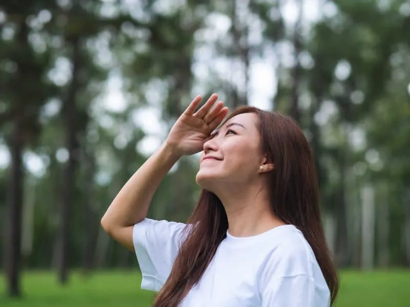 woman finding peace in nature