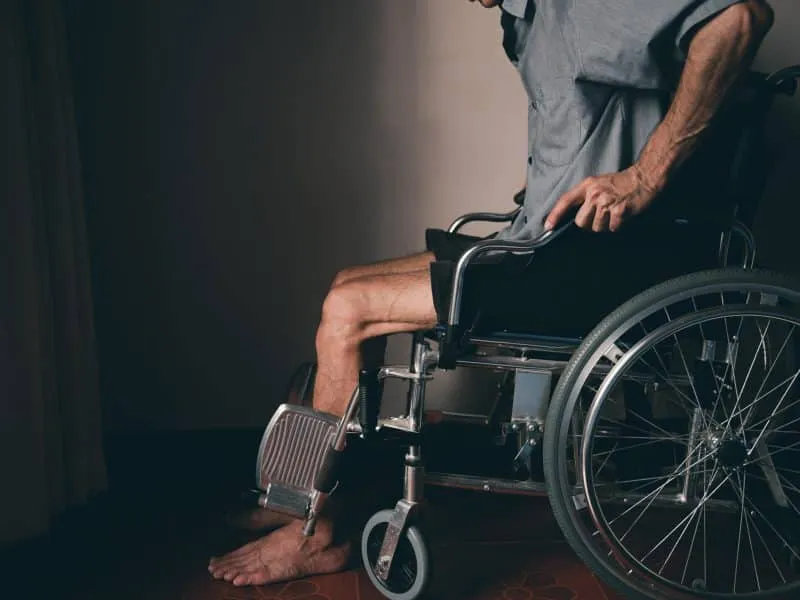 disabled-man-on-wheelchair-lonely-in-the-room-2025-01-07-12-15-42-utc