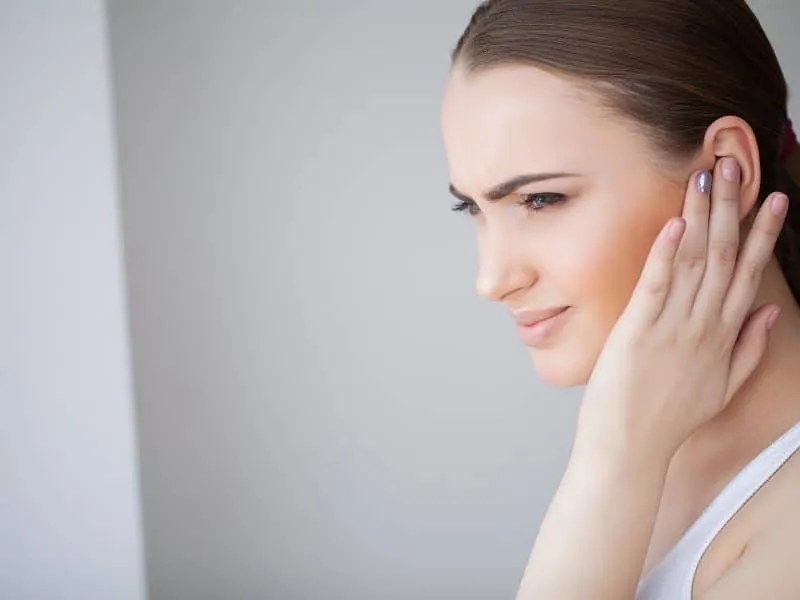 Health and Head Pain. Beautiful Woman Having Strong Headache, Feeling Pain.