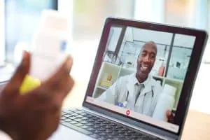 Doctor, laptop and video call for medical consultation online, healthcare research and web collabor.