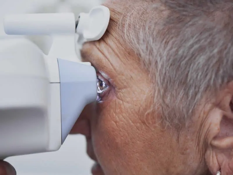 old woman getting her eye examined
