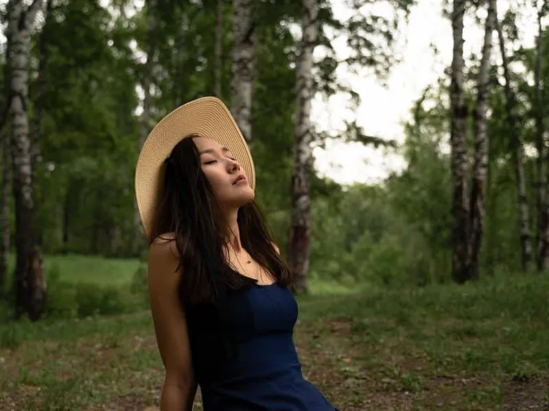 girl enjoys a fresh air in the nature