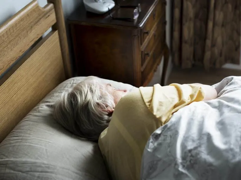 elderly-caucasian-woman-sleeping-on-the-bed-2025-02-10-11-36-10-utc