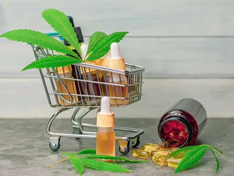 supermarket-trolley-basket-with-cannabis-cbd-oils-2025-01-07-16-03-55-utc