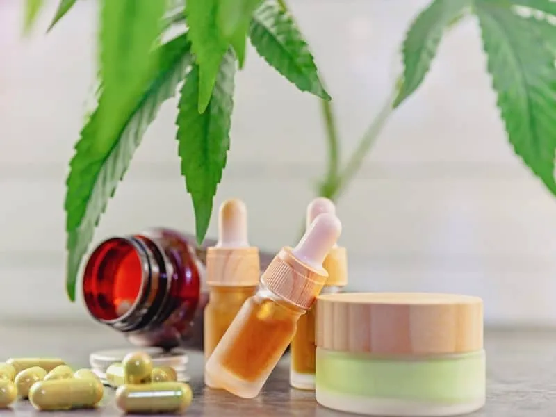 CBD and HHC oil capsules and balm, Medical marijuana products with Cannabis plant